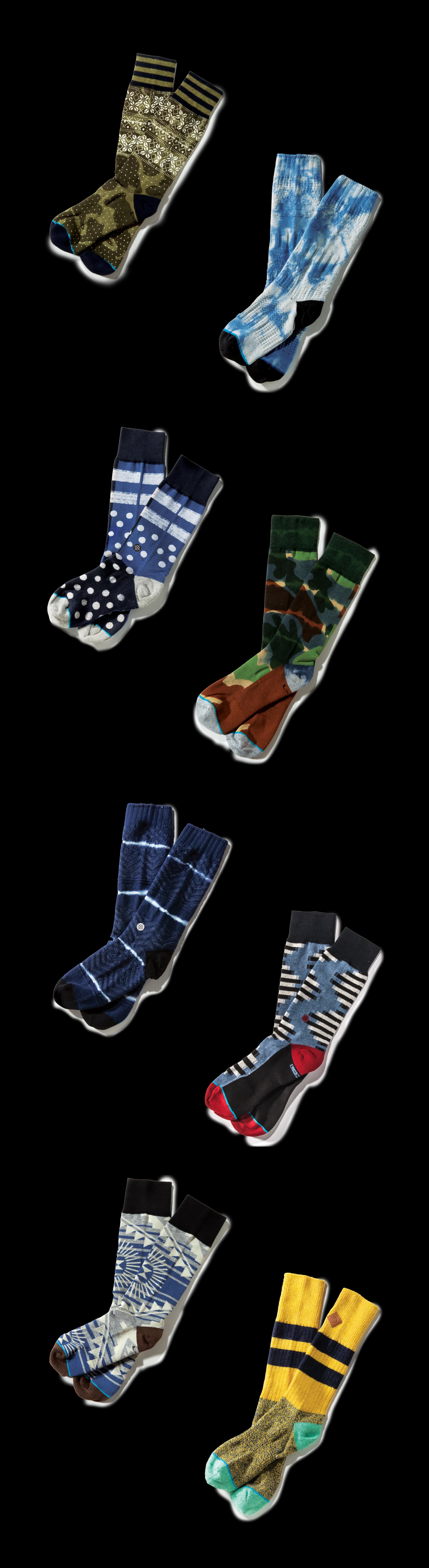 Eight pairs of socks in camo, tie-dye, indigo shibori, stripes, dots and a Southwestern jacquard.