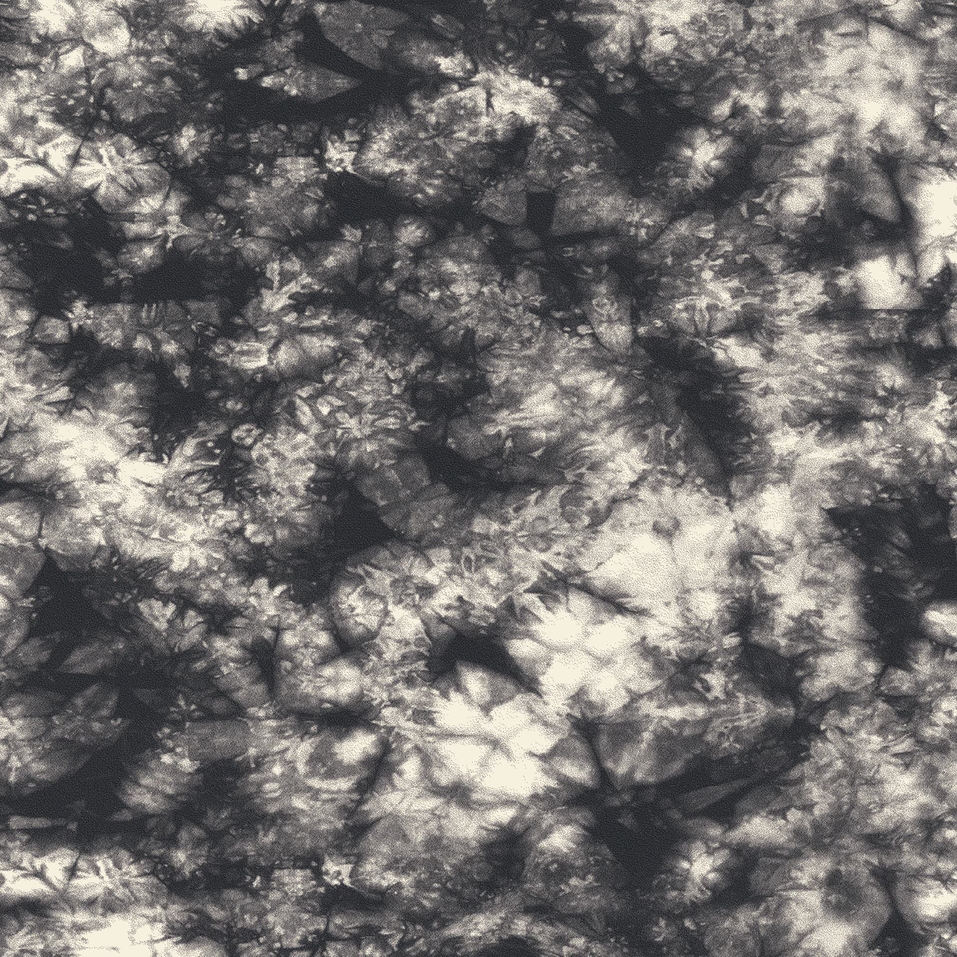 The collection's black and cream tie-dye print, shown flat.
